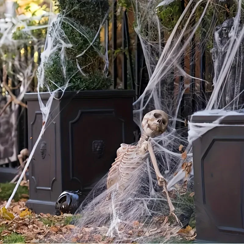 伸縮性のある蜘蛛の巣飾り。各飾りに蜘蛛が2匹ずつ付いています - Spider Web Halloween Decoration のレビューと価格